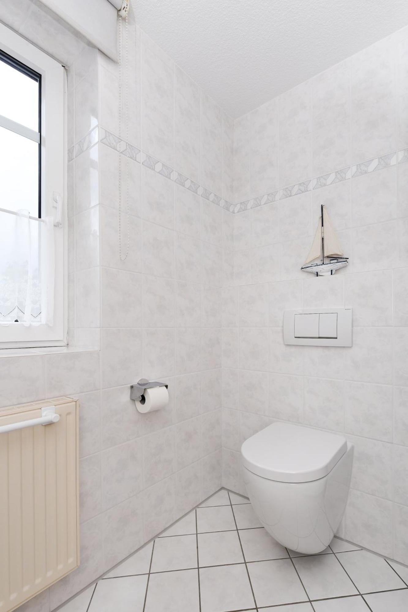 Haus Strandlooper Neuharlingersiel Bagian luar foto